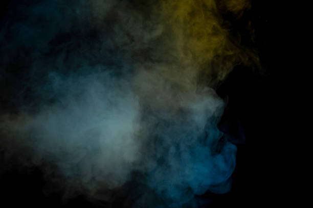 istock Blue and yellow steam on a black background. 1533803704