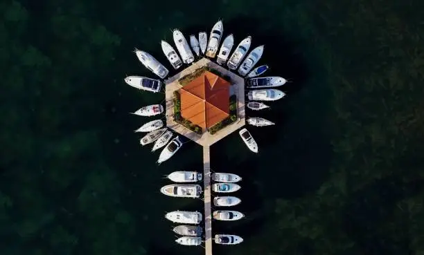 An aerial view of Solaris Boat Marina featuring white boats