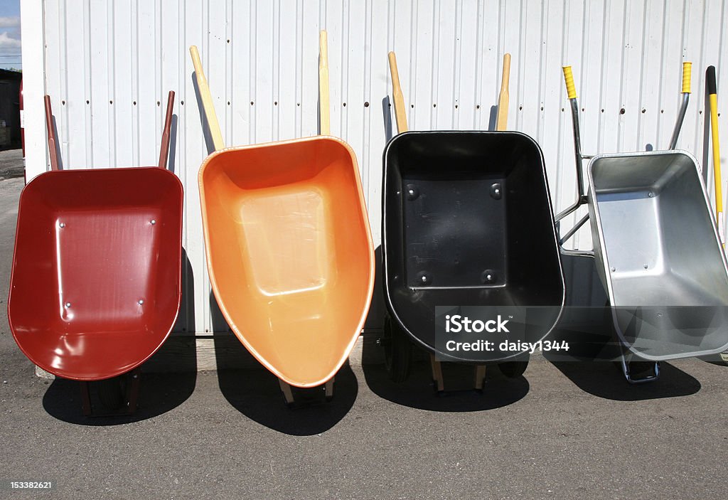 Cztery kolorowe wheelbarrows - Zbiór zdjęć royalty-free (Bez ludzi)