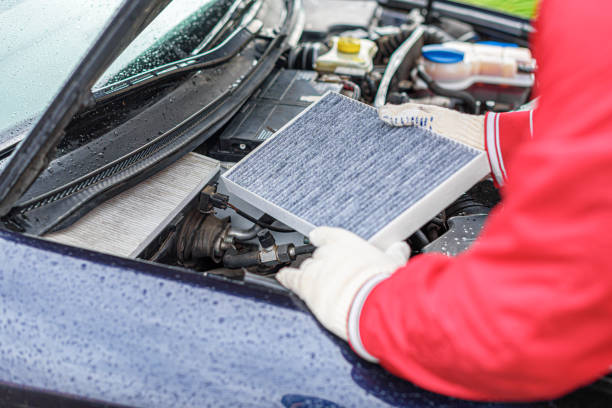 istock Change the filter on the car engine during vehicle maintenance. 1533864615
