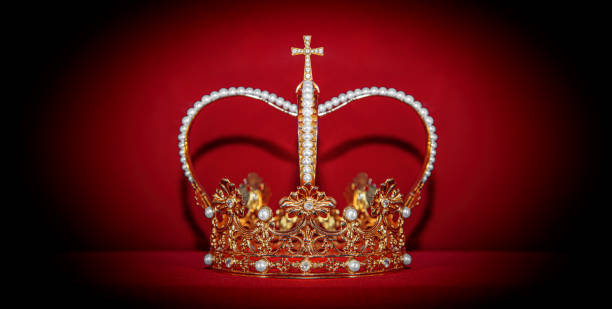 istock Golden crown on red background 1533866341