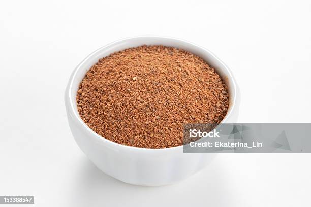 Cinnamon Ground In A Bowl On White Background Stock Photo - Download Image Now - Bowl, Brown, Cinnamon