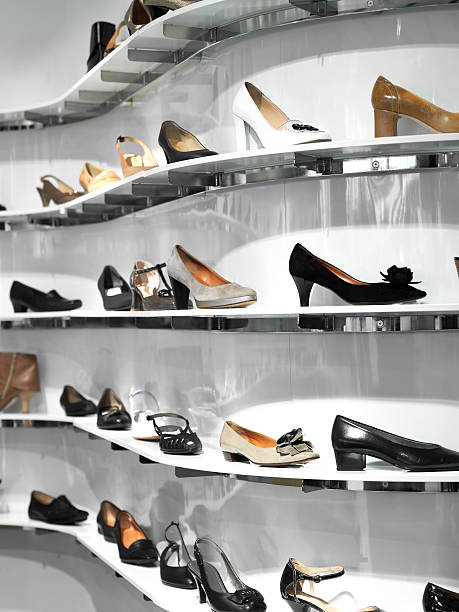 Shelves filled women shoes in a store Close up from a shoe store shoe store stock pictures, royalty-free photos & images