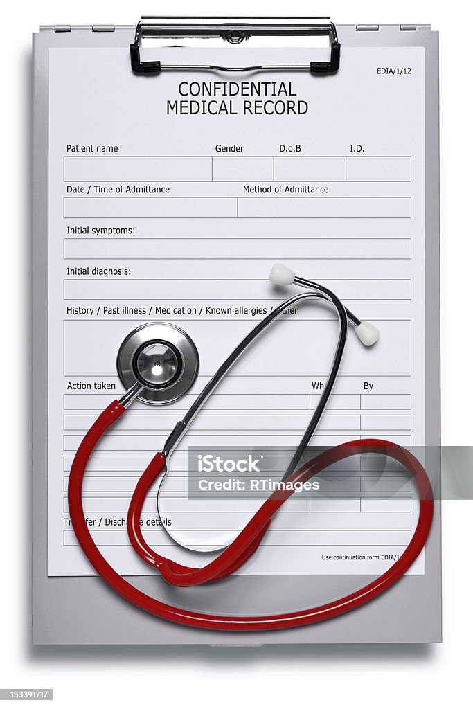 Medical record and stethoscope cut out clipping path Photo of a blank medical record on metal clipboard and red stethoscope isolated on white with clipping path included. Medical Record Stock Photo