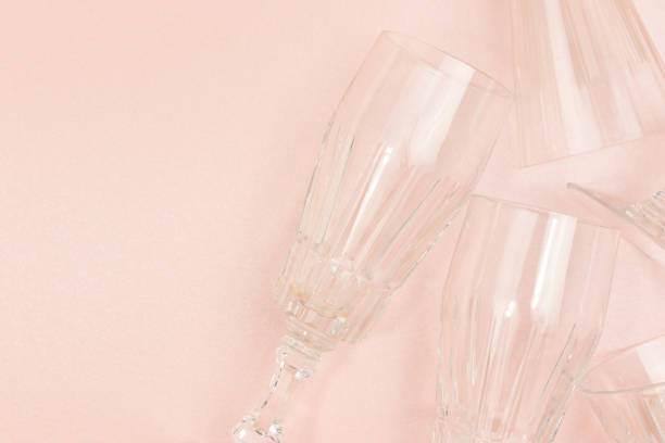 istock Crystal glasses on a pink glittering background. 1533922586