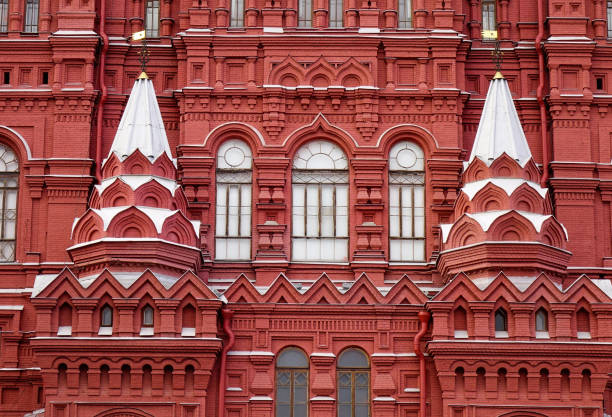 Moscow, Russia - July 26, 2025: People walking near The State Historical Museum,  Russia's largest national historical museum, the building itself is a prominent architectural landmark designed in the Old Russian style. It is situated on Red Square forming an integral part of the square's architectural ensemble