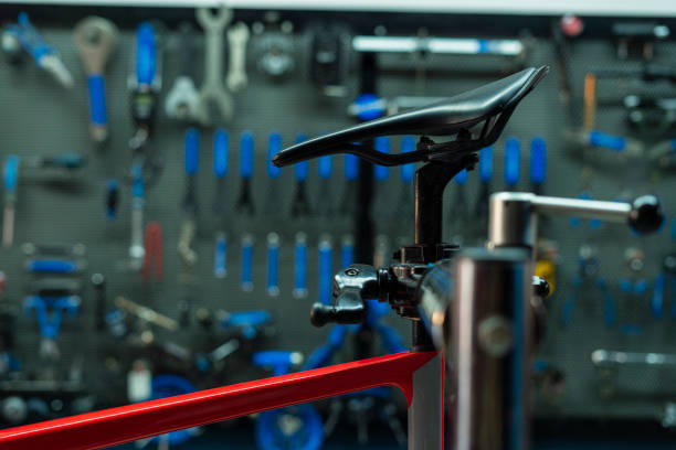 Bicycle frames on wooden wall in store