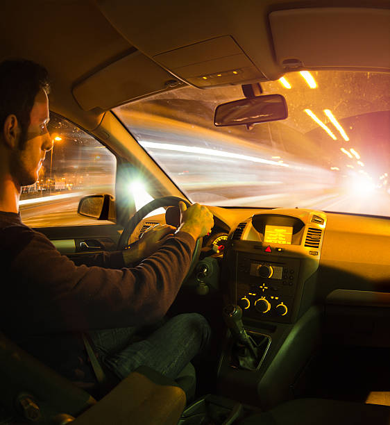 istock Fast speed night car driving on the light traffic. Interior 153398199