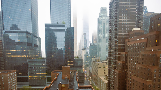 NYC high rise under fog