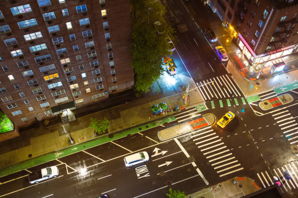 Background blur of darkness over blacked-out streets of Lower Manhattan in New York, NY, USA, after Hurricane Sandy.