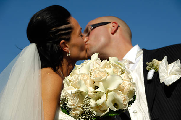 istock Wedding couple kissing 153402836