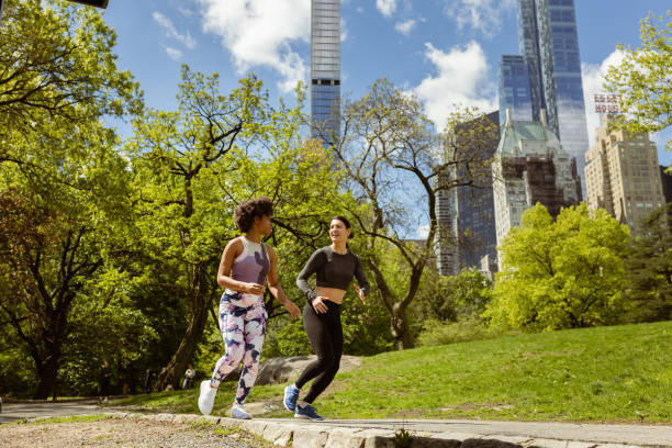 istock Running Towards the Skyline: Active Friends in Central Park 1534034723