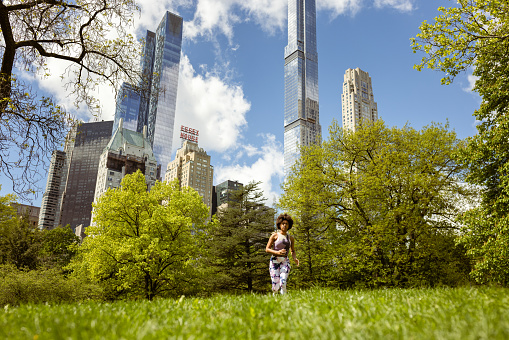 Empowered Black Woman Jogging in Central Park, NYC. 
Fun Fact: Central Park is a haven for over 200 species of birds.