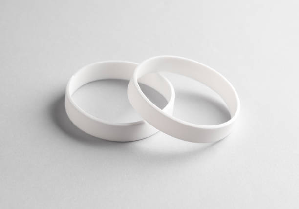 istock White silicone bracelets on gray background. Template for design 1534053632