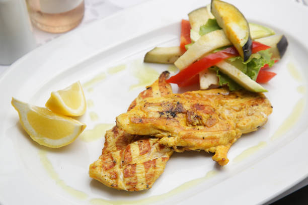 istock Grilled chicken with grilled vegetables served on the restaurant table 1534064281