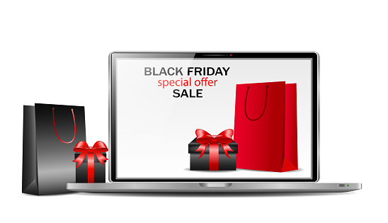 The concept of online shopping on black friday and cyber monday, online orders of goods and gifts from online stores. Laptop with an open page of the online store, advertising banner, e-commerce.