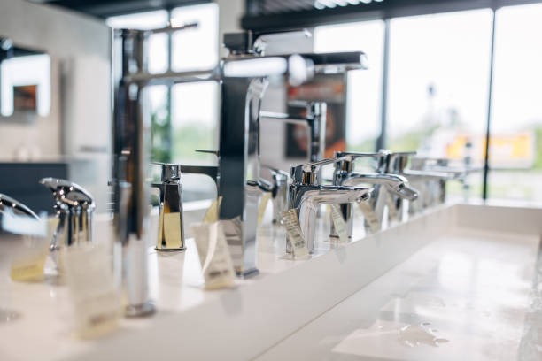 istock Modern bathroom faucets in showroom 1534093857
