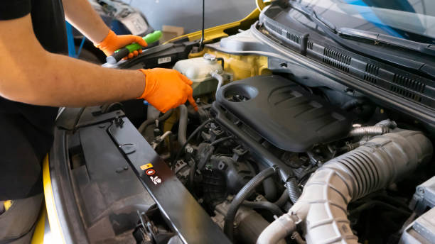 istock image of a mechanic fixing a car engine 1534108865