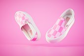 Women's checkered slipons on a pink background. 3D render