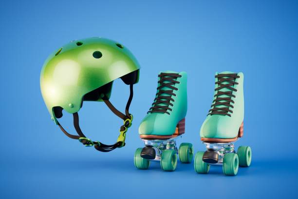 istock active sports. rollers and a green protective helmet on a blue background. 3D render 1534170900