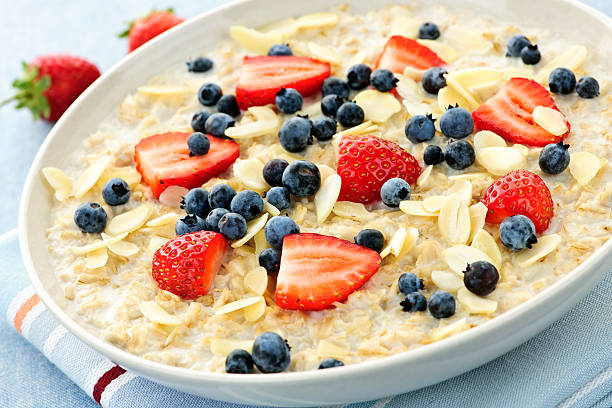 istock Oatmeal breakfast cereal with berries 153417956