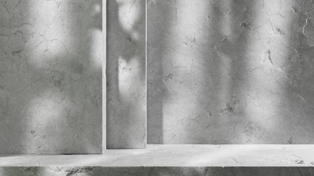 istock Product placement platform with sunlight and leafs shadows. cement concrete plaster platform for products presentations and text design background 1534224933