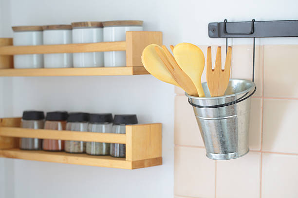 istock Wooden spatulas and rack with spices 153422948