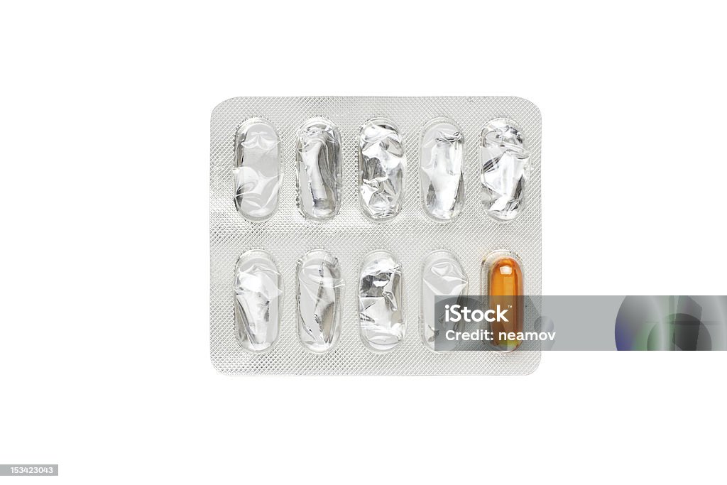 last pill in blister pack. isolated on white Antibiotic Stock Photo