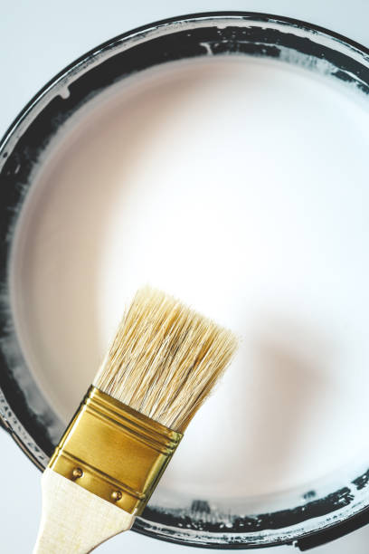 istock Paint brush resting on paint tin viewed from above 1534234743
