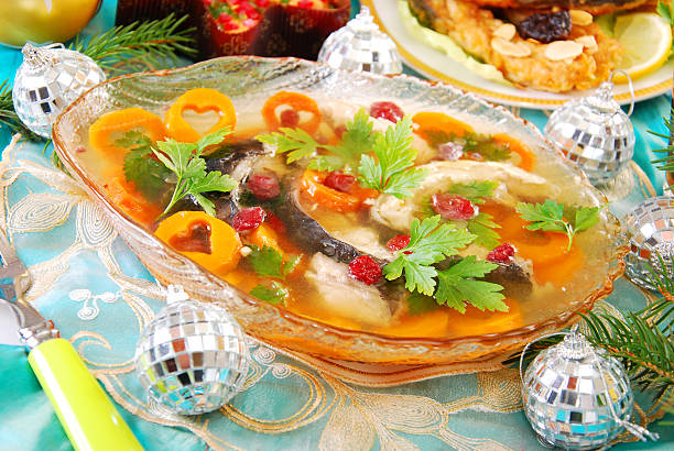 carp in jelly with carrot and cranberry for christmas carp in jelly with carrot and cranberry as traditional polish dish on christmas table aspic stock pictures, royalty-free photos & images