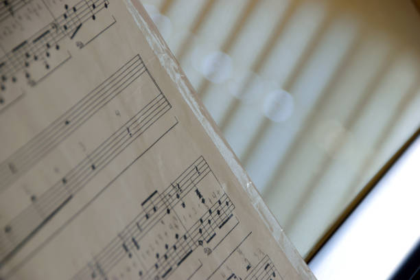 istock Creative closeup of open pages of a music notes book with SELECTIVE FOCUS creating an abstract. Shallow depth of field. 1534238880