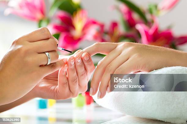 Woman In A Nail Salon Receiving A Manicure Stock Photo - Download Image Now - Nail Salon, Manicure, Hair Salon