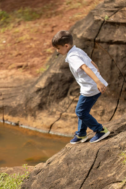 istock boy having fun outdoors 1534256452