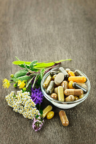 istock Herbal medicine and herbs 153428400