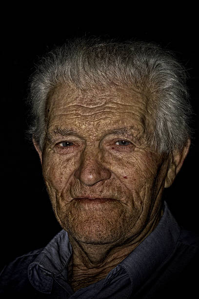 istock Old man with a grey hair portrait in grudge style 153429522