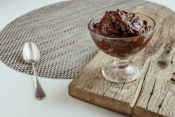 istock Chocolate mousse on a wooden board 1534297701