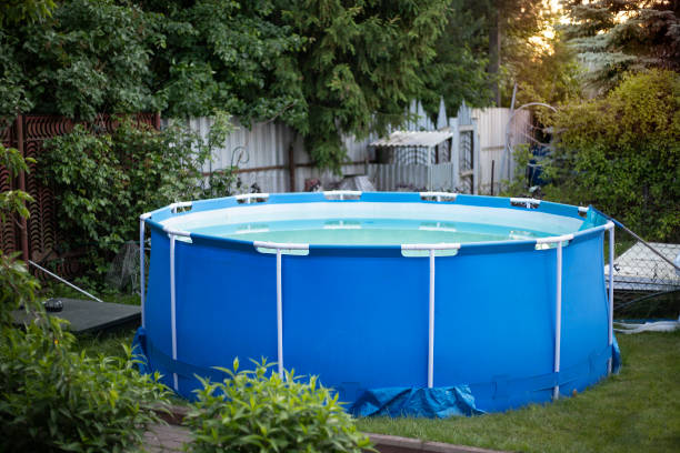 istock blue pool in the country in summer 1534319487