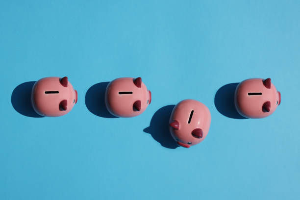 Piggy bank on yellow background