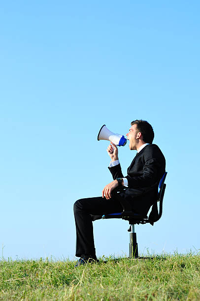 istock Business Man with loudspeaker 153437477