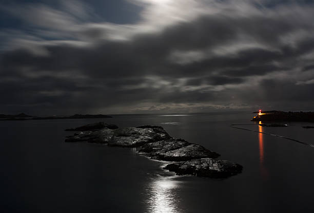 istock Sea and rocks at night 153442554