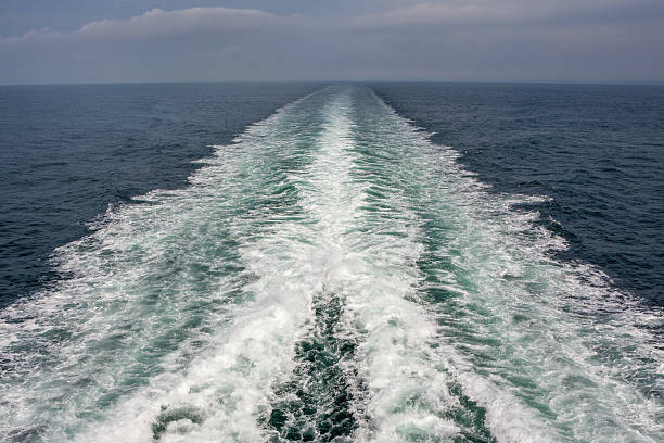 istock Waves behind a ship on the sea 153443190