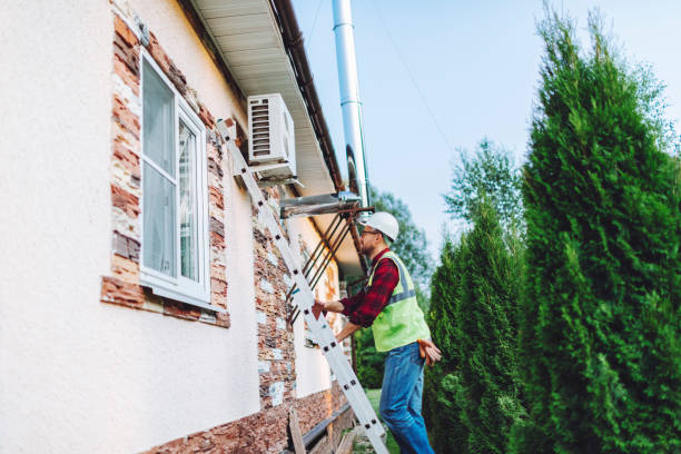 istock Technician in uniform repairing heat pump 1534435769
