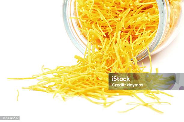 Homemade Pasta Coming Out Of Glass Jar On White Background Stock Photo - Download Image Now