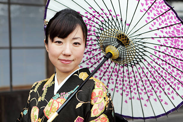 istock Woman in kimono with umbrella 153447572