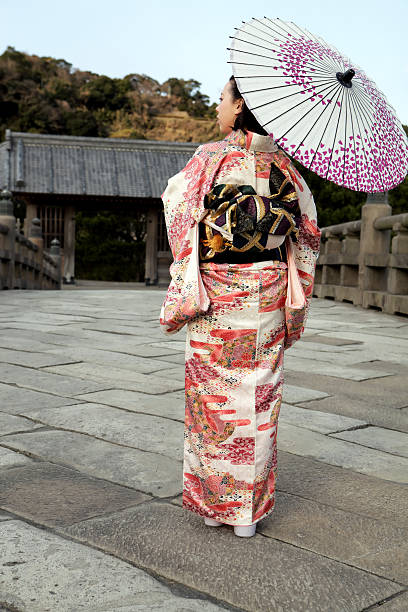 istock Woman in kimono with umbrella 153447603