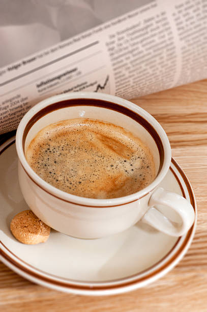 istock Coffee and financial newspaper 153448898