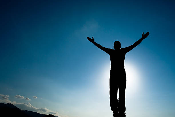 istock Silhouette of climbing young adult 153449072
