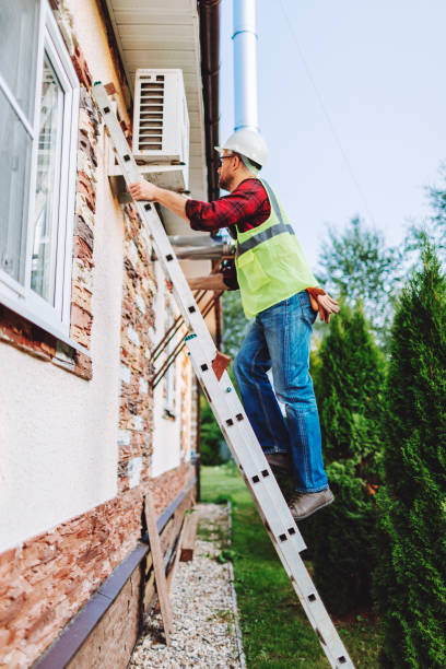 istock Technician in uniform repairing heat pump 1534508822