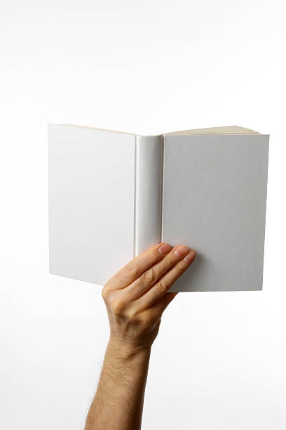 istock Holding a white blank book against white background 153451344