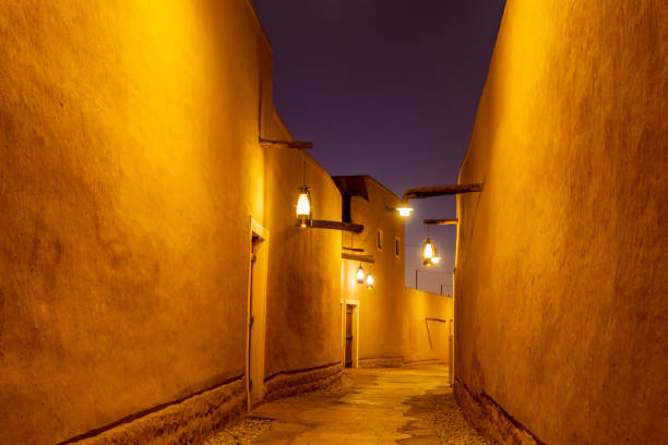 Diriyah old town traditional street illuminated at night, Riyadh, Saudi Arabia
